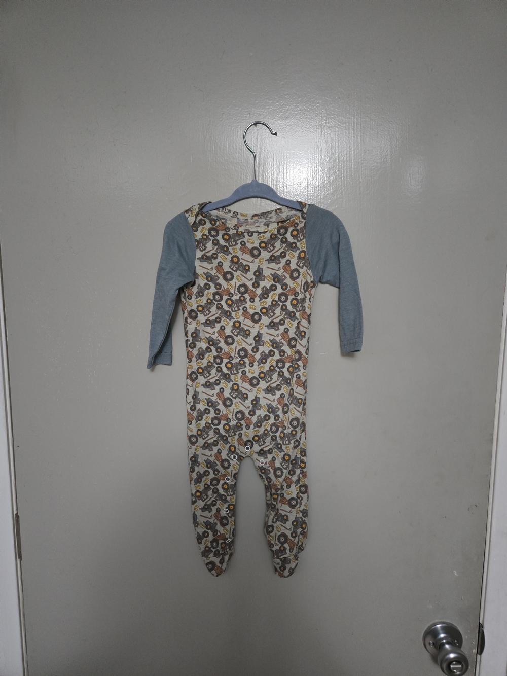 Baby Footed Pajamas with Blue Sleeves and Tractor Print